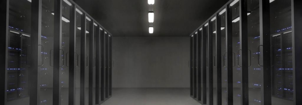 Server room with glowing lights and data streams